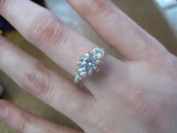 Rose Gold Three Stone Moissanite and Diamond Ring